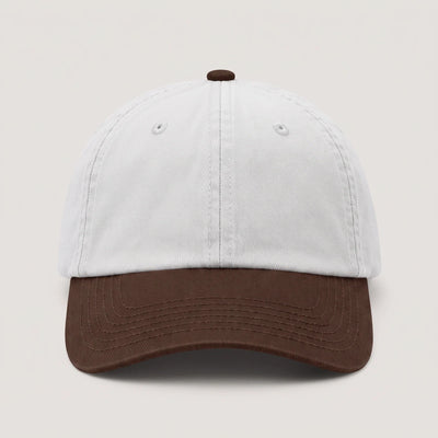 Plain two tone dad cap with a white crown and a brown peak, front view with no logo