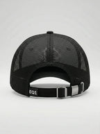 Black trucker baseball cap with breathable mesh back and adjustable fit system