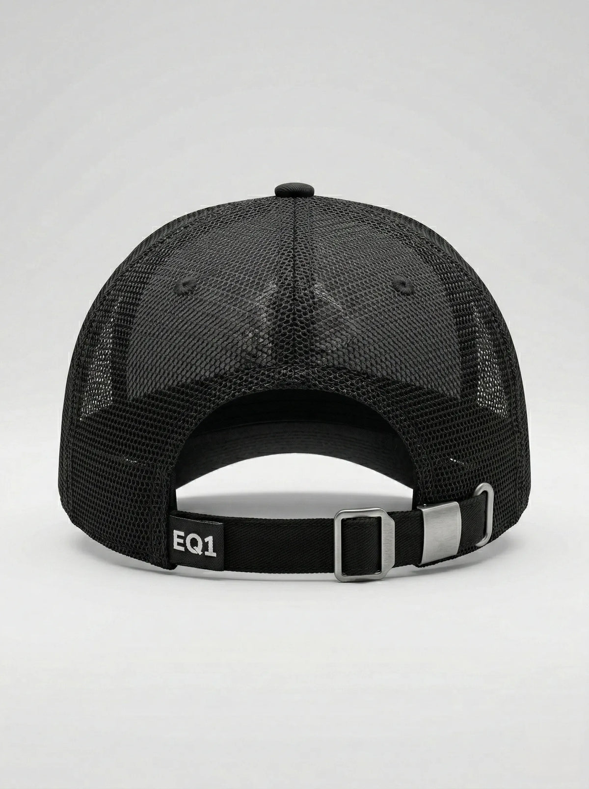 Black trucker baseball cap with breathable mesh back and adjustable fit system