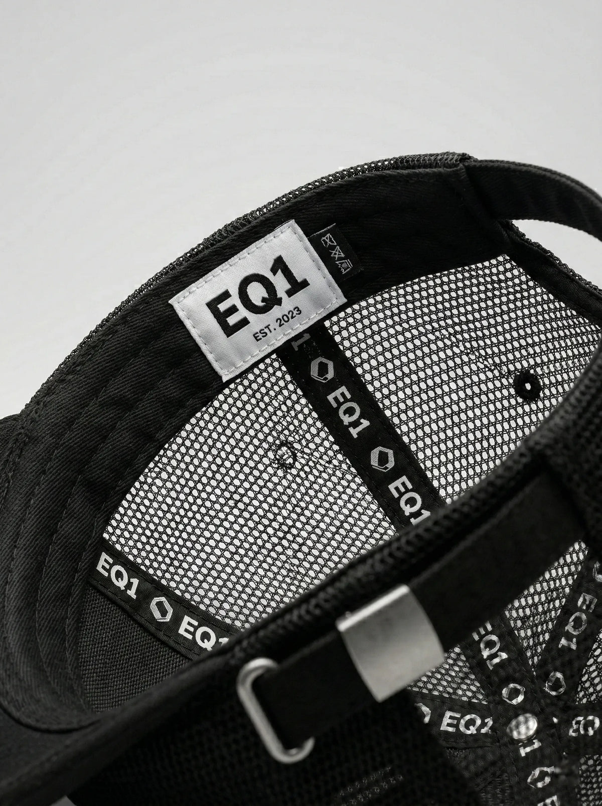 Black EQ1 mesh cap back view