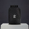 Minimal black backpack for office, travel, and daily use with EQ1 branding