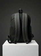 Back view of backpack with padded straps and black design