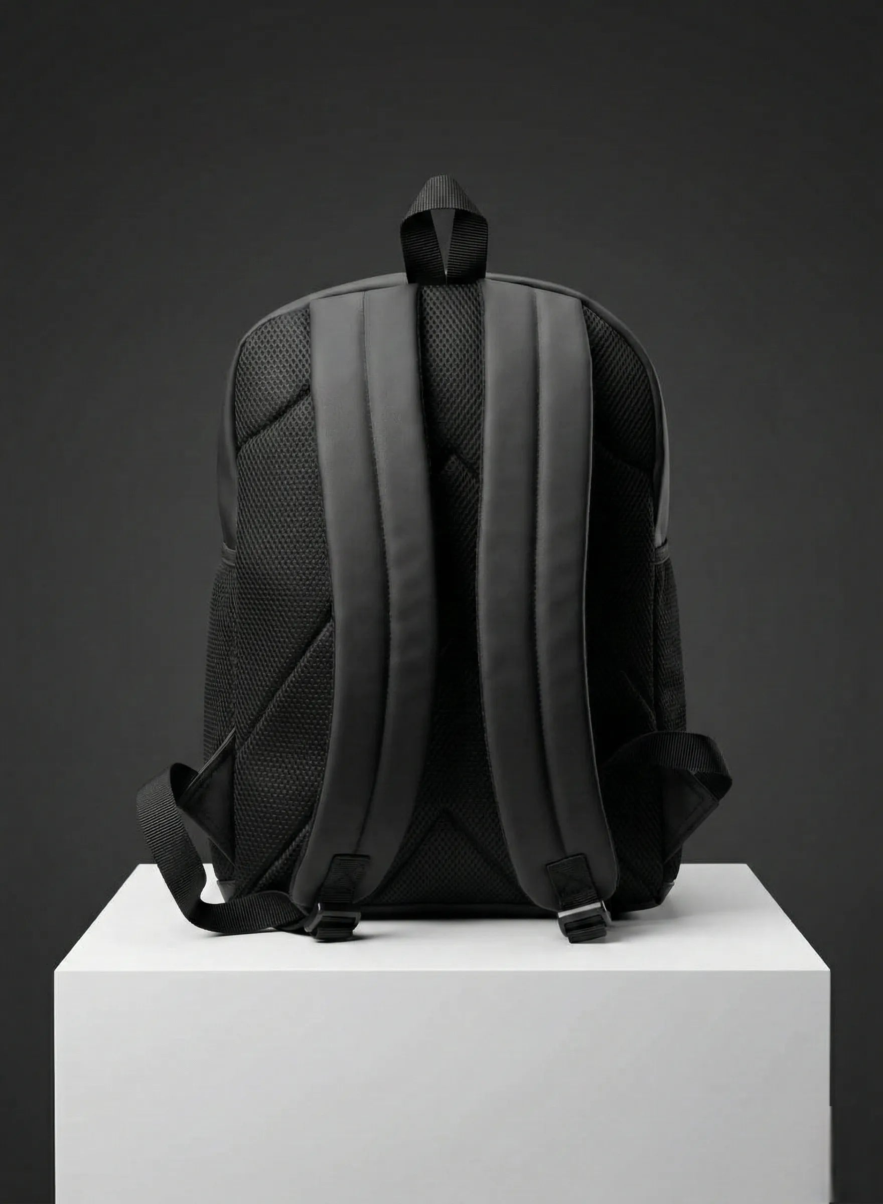 Back view of backpack with padded straps and black design