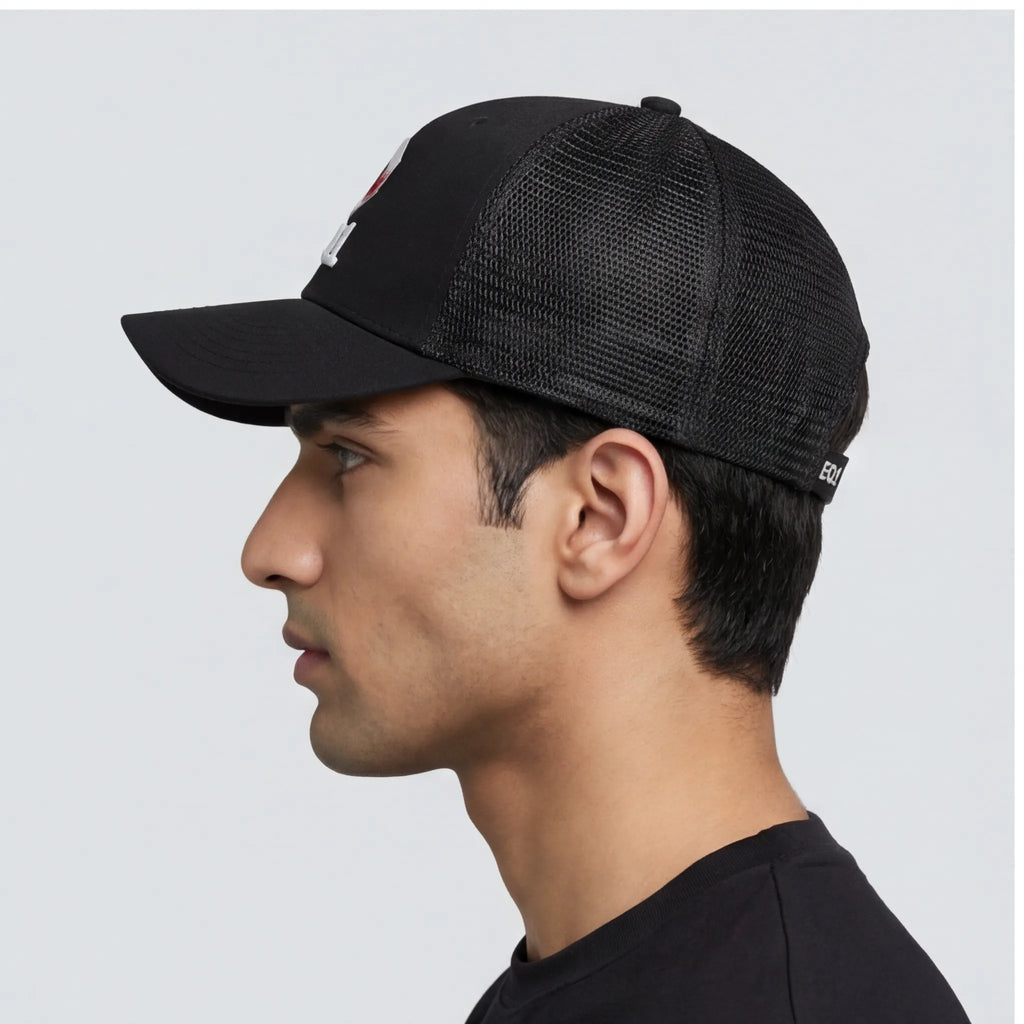 Side view of black EQ1 trucker cap