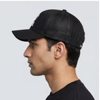 Side view of black EQ1 trucker cap
