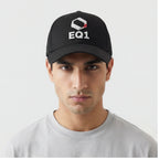 a male model wear a black baseball cap