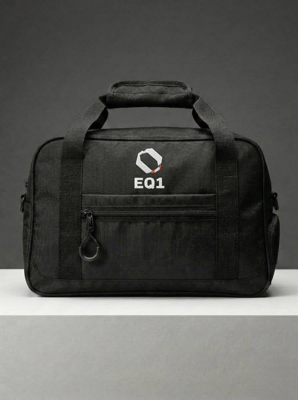 Front view of EQ1 Core Duffel bag in stealth black design