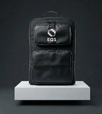 Black EQ1 backpack with dual front pockets and minimalist utility design