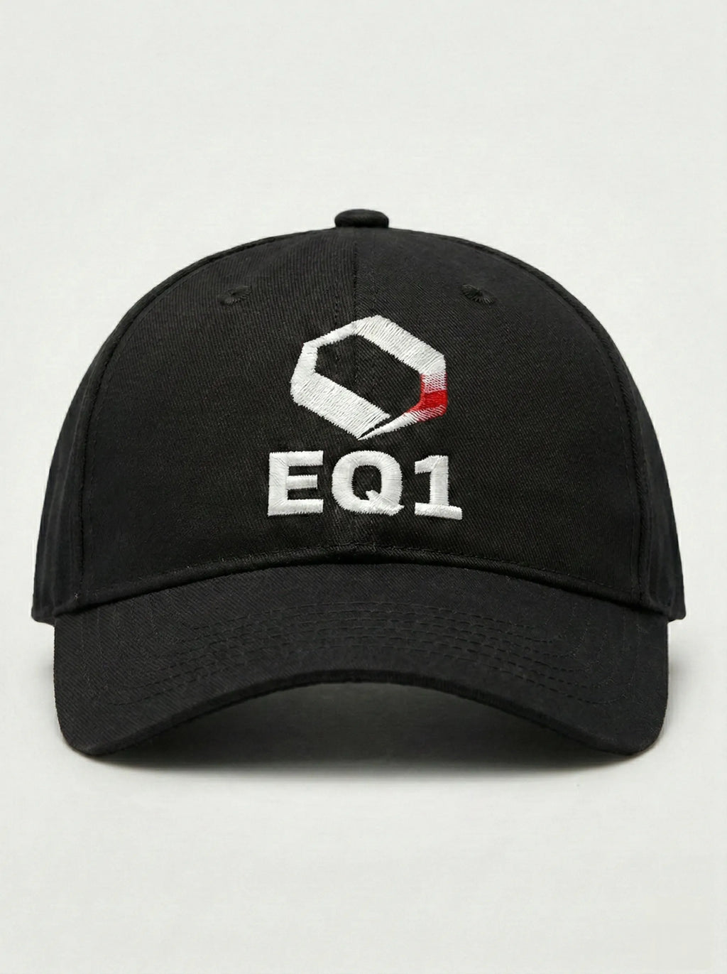 Black canvas baseball cap with minimal design and EQ1 branding