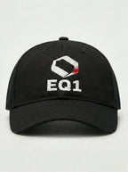 Black canvas baseball cap with minimal design and EQ1 branding