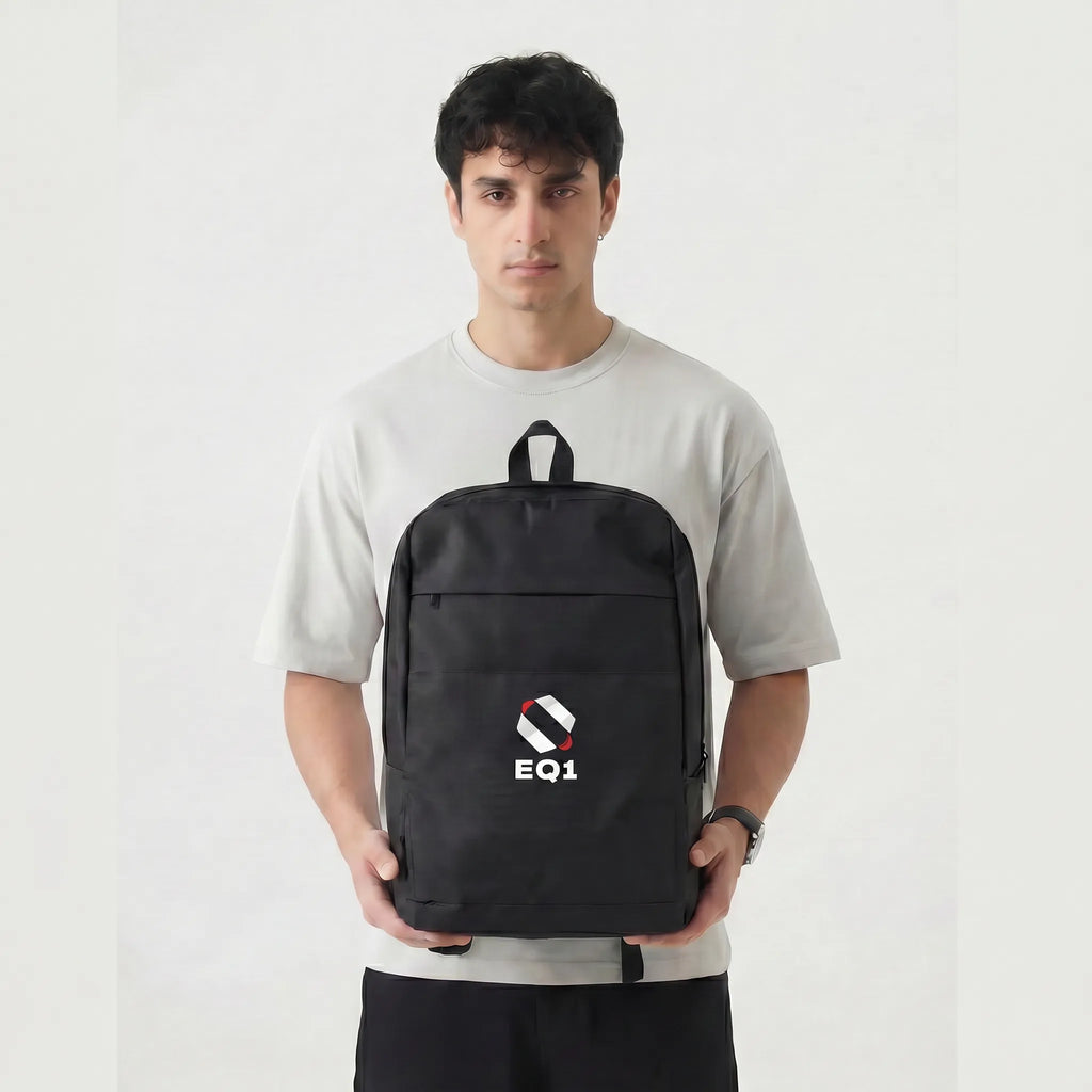 Minimal black backpack for office, travel, and daily use with EQ1 branding