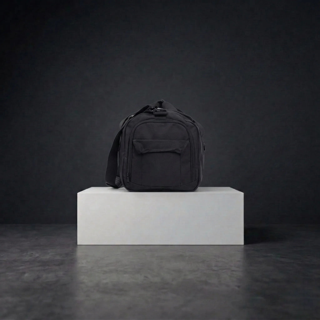 Side view of black duffle bag with straps and compartments