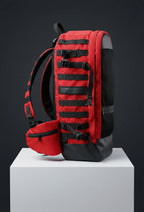 Side view of red and black backpack