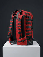 Side view of red and black backpack