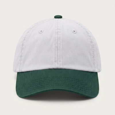 Plain two tone dad cap with a white crown and a forest green peak, front view with no logo