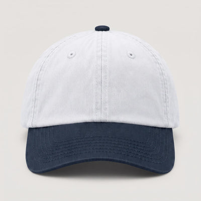 Plain two tone dad cap with a white crown and a navy peak, front view with no logo